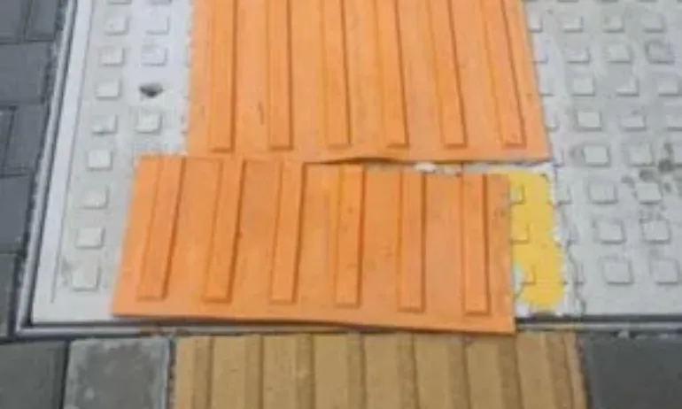 Кратките летни дъждове в София изровиха скъпите плочки на новоремонтираната Опълченска - Tribune.bg