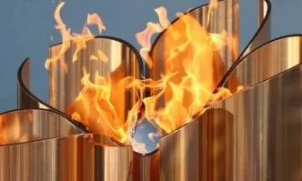 Япония скри олимпийския огън